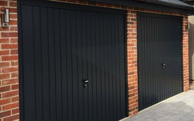 Retractable steel framed garage doors