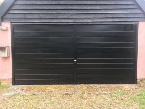 Up and over, retractable steel framed Garage Door