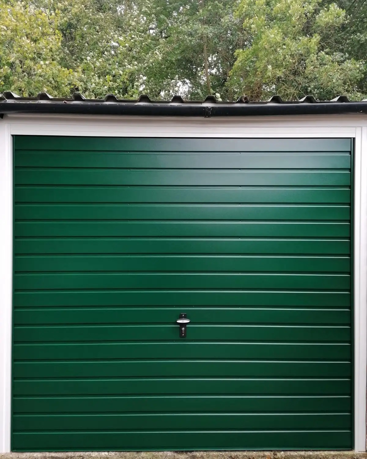 green garage door East Anglia Garage Doors Ltd.